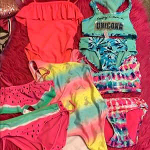 5 bathing suits! $5/piece. Sold individually